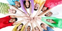 Large group of people standing in a circle.